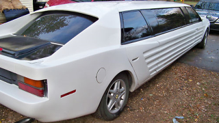Illustration for article titled Taurus SHO-powered Faux-rarri limo is as weird as it sounds